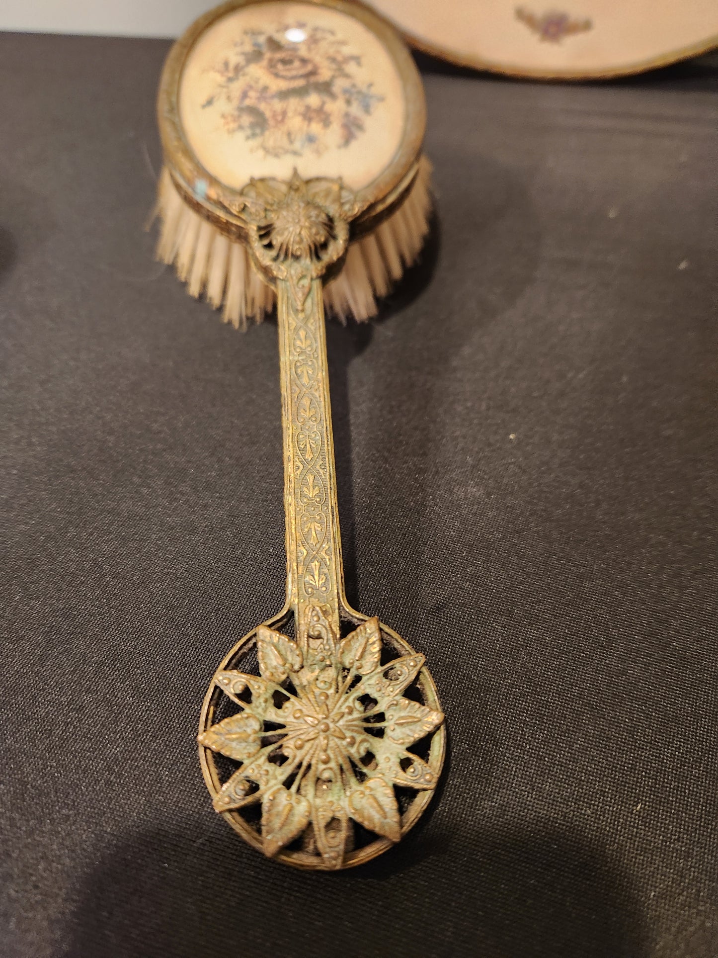 Antique brass vanity set.