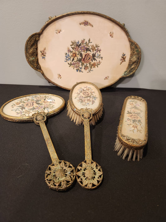 Antique brass vanity set.