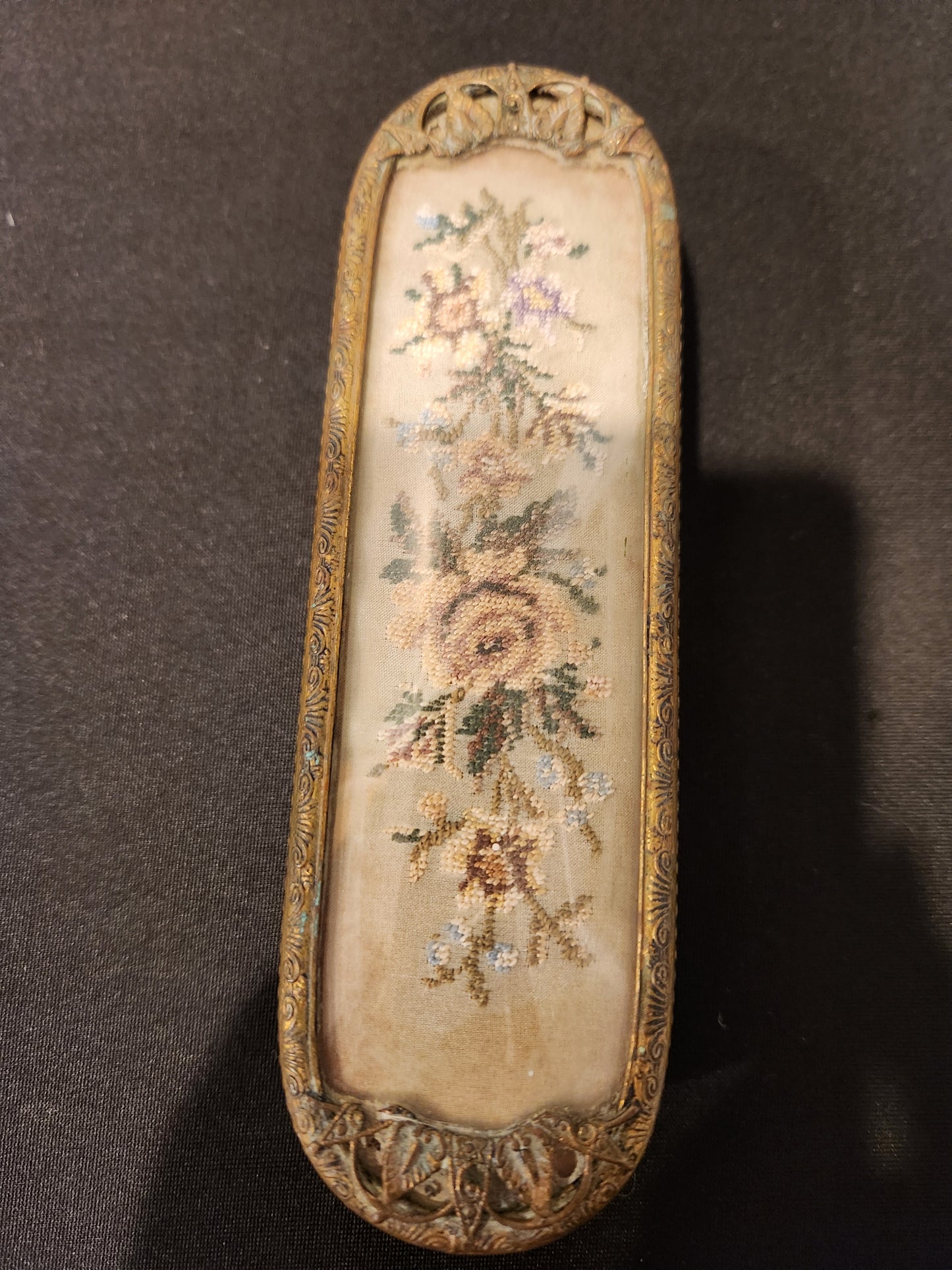 Antique brass vanity set.